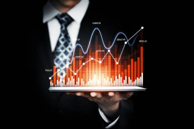Businessman analyst working with digital finance business data graph showing technology of investment strategy for perceptive financial business decision. Digital economic analysis technology concept.