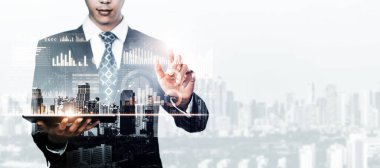 Businessman analyst working with digital finance business data graph showing technology of investment strategy for perceptive financial business decision. Digital economic analysis technology concept.