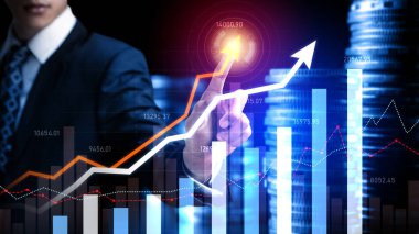 Businessman analyst working with digital finance business data graph showing technology of investment strategy for perceptive financial business decision. Digital economic analysis technology concept.