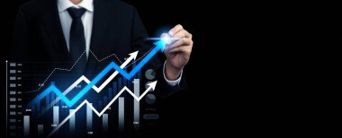 Businessman analyst working with digital finance business data graph showing technology of investment strategy for perceptive financial business decision. Digital economic analysis technology concept.