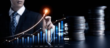 Businessman analyst working with digital finance business data graph showing technology of investment strategy for perceptive financial business decision. Digital economic analysis technology concept.