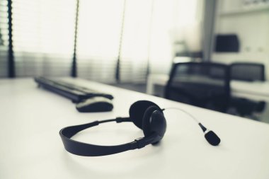 Close up image of headphones for competent online working. Customer service operator equipments.