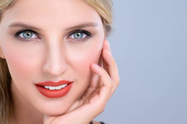 Closeup pretty beautiful woman with alluring perfect smooth and clean skin portrait in isolated background. Hand gesture with expressive facial expression for beauty model concept.