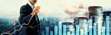 Businessman analyst working with digital finance business data graph showing technology of investment strategy for perceptive financial business decision. Digital economic analysis technology concept.