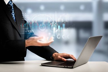 Businessman analyst working with digital finance business data graph showing technology of investment strategy for perceptive financial business decision. Digital economic analysis technology concept.