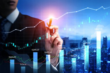 Businessman analyst working with digital finance business data graph showing technology of investment strategy for perceptive financial business decision. Digital economic analysis technology concept.