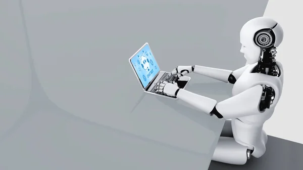 人工智能机器人在计算机上使用时髦软件 — 图库照片