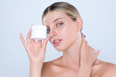 Alluring beautiful perfect cosmetic skin woman portrait hold mockup jar cream or moisturizer for skincare treatment, anti-aging product in isolated background. Natural healthy skin model concept.