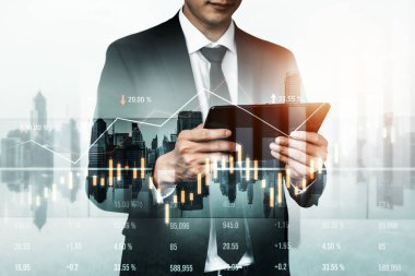 Businessman analyst working with digital finance business data graph showing technology of investment strategy for perceptive financial business decision. Digital economic analysis technology concept.