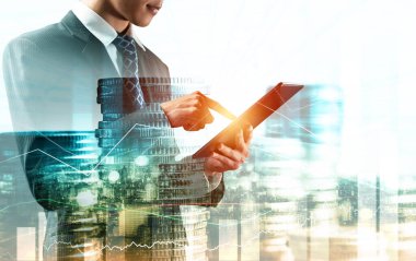 Businessman analyst working with digital finance business data graph showing technology of investment strategy for perceptive financial business decision. Digital economic analysis technology concept.