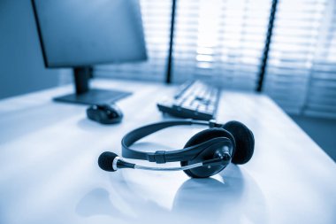 Essential equipment concept for competent online operators, call service agents, or online working. Customer service equipment, as well as helpdesk tools.