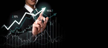 Businessman analyst working with digital finance business data graph showing technology of investment strategy for perceptive financial business decision. Digital economic analysis technology concept.