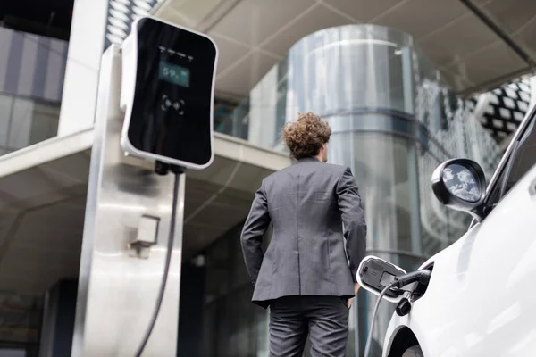 View Progressive Businessman Electric Car Recharging Public Charging Station Modern — Photo