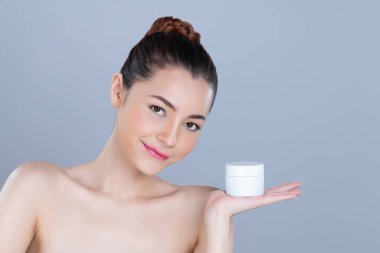 Glamorous beautiful perfect cosmetic skin with soft makeup woman portrait hold mockup jar cream or moisturizer for skincare treatment and anti-aging product advertisement in isolated background.
