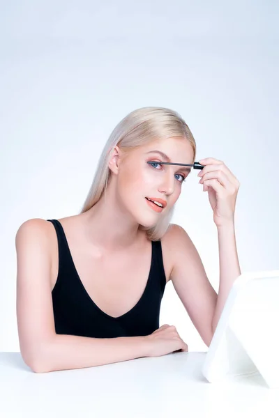 Personable Woman Blond Hair Putting Black Mascara Brush Hand Long — Fotografia de Stock