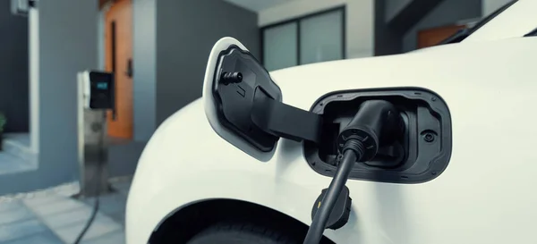 Closeup Electric Vehicle Plugged Cable Charging Point Powered Progressive Concept — Photo