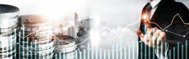 Businessman analyst working with digital finance business data graph showing technology of investment strategy for perceptive financial business decision. Digital economic analysis technology concept.