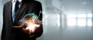 Businessman analyst working with digital finance business data graph showing technology of investment strategy for perceptive financial business decision. Digital economic analysis technology concept.