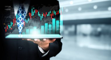 Businessman analyst working with digital finance business data graph showing technology of investment strategy for perceptive financial business decision. Digital economic analysis technology concept.