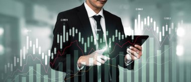 Businessman analyst working with digital finance business data graph showing technology of investment strategy for perceptive financial business decision. Digital economic analysis technology concept.