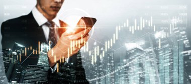 Businessman analyst working with digital finance business data graph showing technology of investment strategy for perceptive financial business decision. Digital economic analysis technology concept.