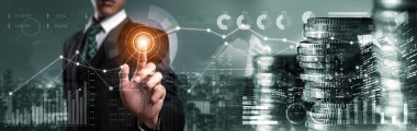 Businessman analyst working with digital finance business data graph showing technology of investment strategy for perceptive financial business decision. Digital economic analysis technology concept.
