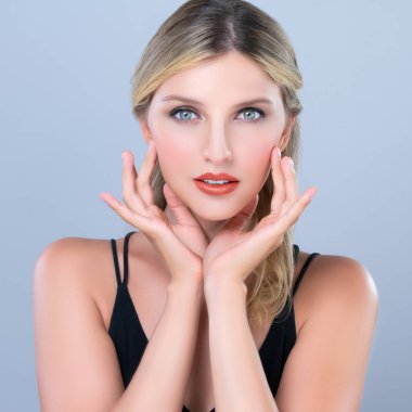 Pretty beautiful woman portrait with alluring perfect smooth and clean skin portrait in isolated background. Hand gesture with expressive facial expression for beauty model concept.