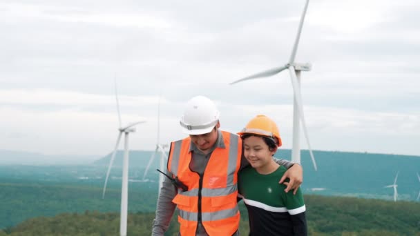 Engineer His Son Wind Farm Atop Hill Mountain Rural Progressive — Stock Video