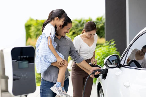 Progressive Young Parent Teach Daughter How Recharge Refuel Car Home — Foto de Stock