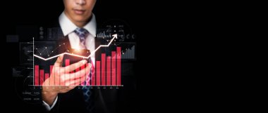 Businessman analyst working with digital finance business data graph showing technology of investment strategy for perceptive financial business decision. Digital economic analysis technology concept.