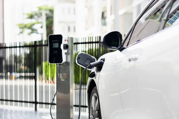 Focus Closeup Electric Vehicle Plugged Charger Device Blurred Background Public — 图库照片