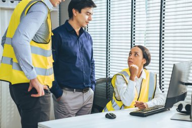 Competent engineers create blueprints and plans and present them to their boss. Architectural investors working with engineers for engineering project.