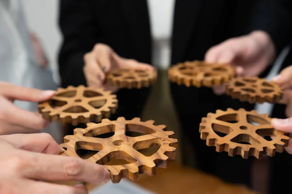 Closeup Hand Holding Wooden Gear Businesspeople Wearing Suit Harmony Synergy — Stok fotoğraf