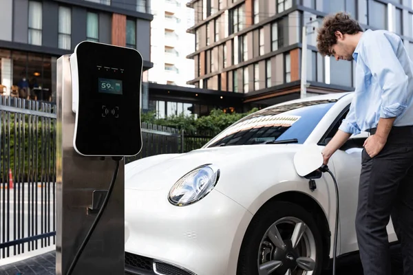 Progressive Businessman Insert Charger Plug Charging Station His Electric Vehicle — Stok fotoğraf