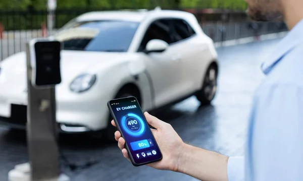 Closeup Progressive Businessman Look Cars Battery Status Application Smart Phone — Stock Photo, Image