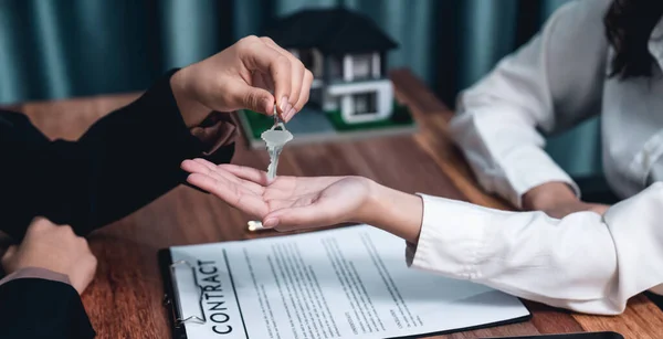 Real Estate Agent Hands Key Buyer Symbol Ownership Successful Completion — Stock Photo, Image