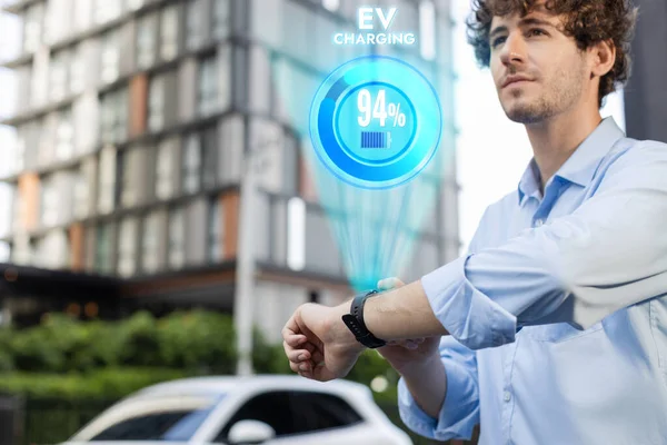 Progressive Businessman Check Wearable Hologram Watch Electric Car Battery Being — Foto Stock