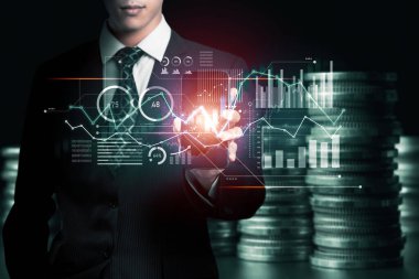 Businessman analyst working with digital finance business data graph showing technology of investment strategy for perceptive financial business decision. Digital economic analysis technology concept.