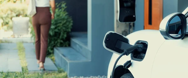 Focus Charger Plugged Car Home Charging Station Blurred Background Progressive — ストック写真