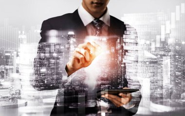 Businessman analyst working with digital finance business data graph showing technology of investment strategy for perceptive financial business decision. Digital economic analysis technology concept.