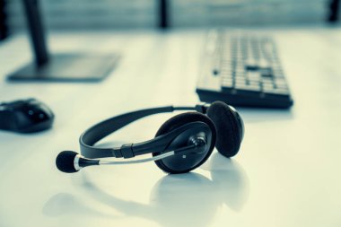 Essential equipment concept for competent online operators, call service agents, or online working. Customer service equipment, as well as helpdesk tools.