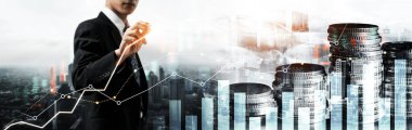 Businessman analyst working with digital finance business data graph showing technology of investment strategy for perceptive financial business decision. Digital economic analysis technology concept.