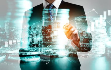 Businessman analyst working with digital finance business data graph showing technology of investment strategy for perceptive financial business decision. Digital economic analysis technology concept.