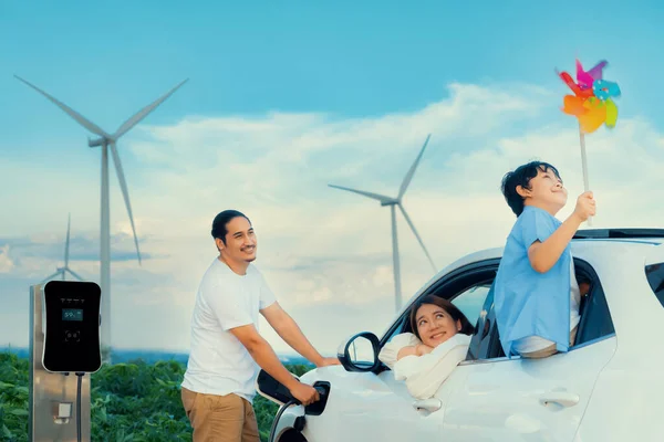 Concept Progressive Happy Family Holding Windmill Toy Relax Wind Farm — Photo