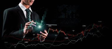 Businessman analyst working with digital finance business data graph showing technology of investment strategy for perceptive financial business decision. Digital economic analysis technology concept.