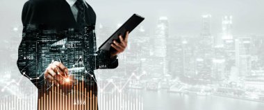 Businessman analyst working with digital finance business data graph showing technology of investment strategy for perceptive financial business decision. Digital economic analysis technology concept.