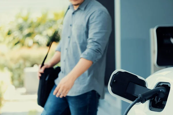 Focus Electric Car Charging Home Charging Station Blurred Progressive Man — Stock fotografie