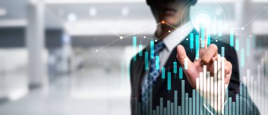 Businessman analyst working with digital finance business data graph showing technology of investment strategy for perceptive financial business decision. Digital economic analysis technology concept.