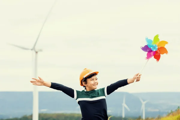 Progressive Young Asian Boy Playing Wind Pinwheel Toy Wind Turbine — Fotografia de Stock
