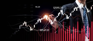 Businessman analyst working with digital finance business data graph showing technology of investment strategy for perceptive financial business decision. Digital economic analysis technology concept.